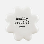 East Of India white porcelain token with black wording 'Really Proud Of You'