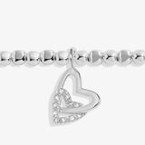 Silver bracelet with two hearts linked