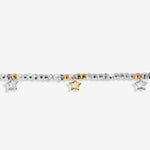 Joma beaded bracelet with trio charm design