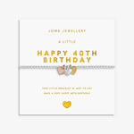 A silver bracelet with a 40th birthday theme, featuring a central silver heart charm with rose gold and gold hearts, displayed on a white Joma Jewellery card with gold text.