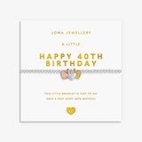 A silver bracelet with a 40th birthday theme, featuring a central silver heart charm with rose gold and gold hearts, displayed on a white Joma Jewellery card with gold text.