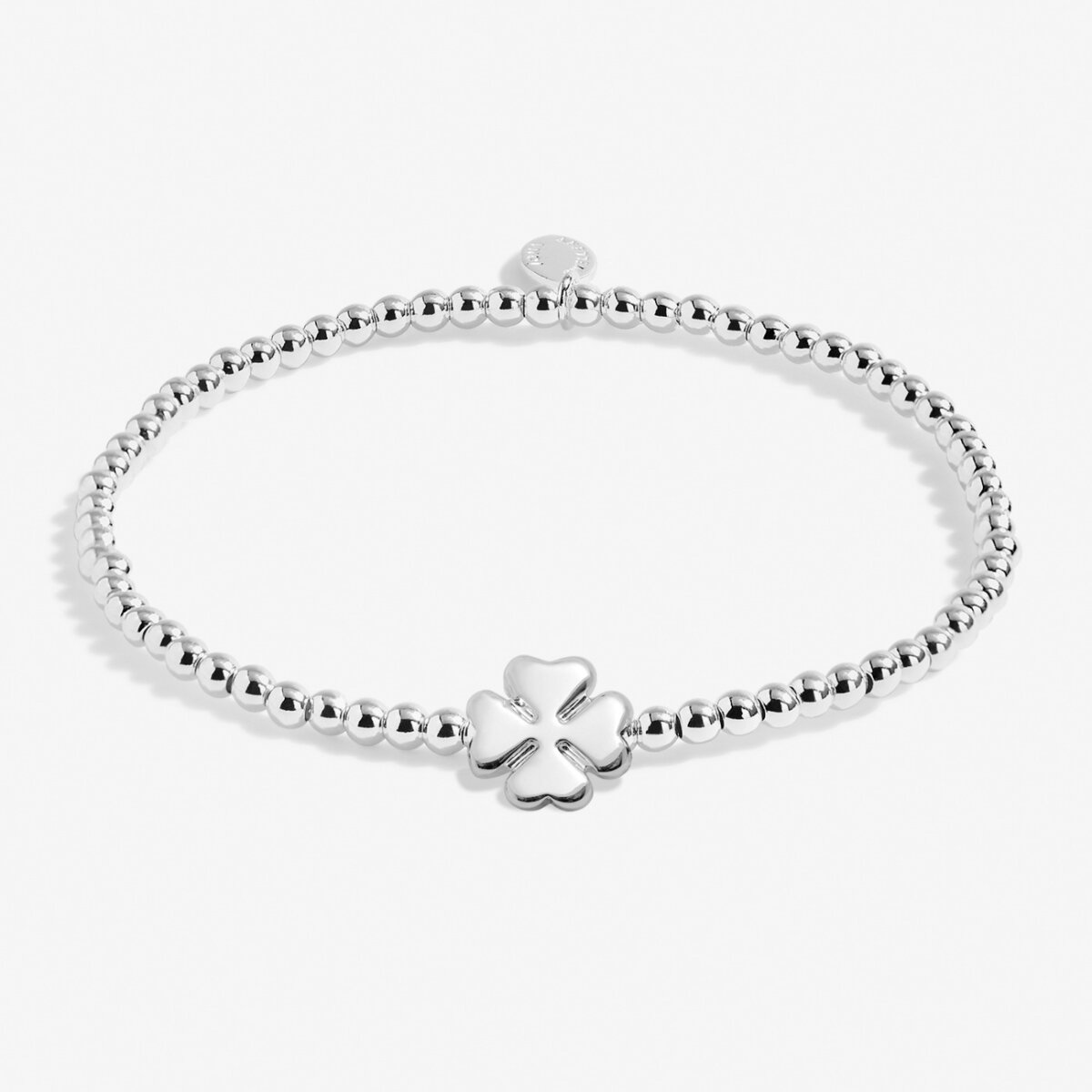 Joma Jewellery silver plated beaded bracelet with four leaf clover charm presented on a foil stamped sentiment card.