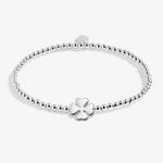 Joma Jewellery silver plated beaded bracelet with four leaf clover charm presented on a foil stamped sentiment card.