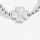 Joma Jewellery silver plated beaded bracelet with four leaf clover charm presented on a foil stamped sentiment card.