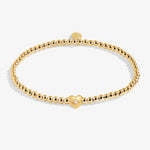Joma Jewellery gold plated stretch beaded bracelet with heart charm and presented on a foil stamped sentiment card.