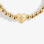 Joma Jewellery gold plated stretch beaded bracelet with heart charm and presented on a foil stamped sentiment card.