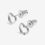 Silver heart-shaped stud earrings on a white background