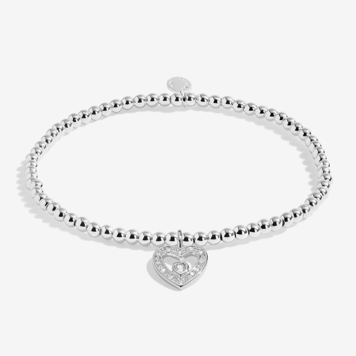 Joma Jewellery stretch beaded bracelet with hanging heart sparkly charm presented on a foil stamped sentiment card.