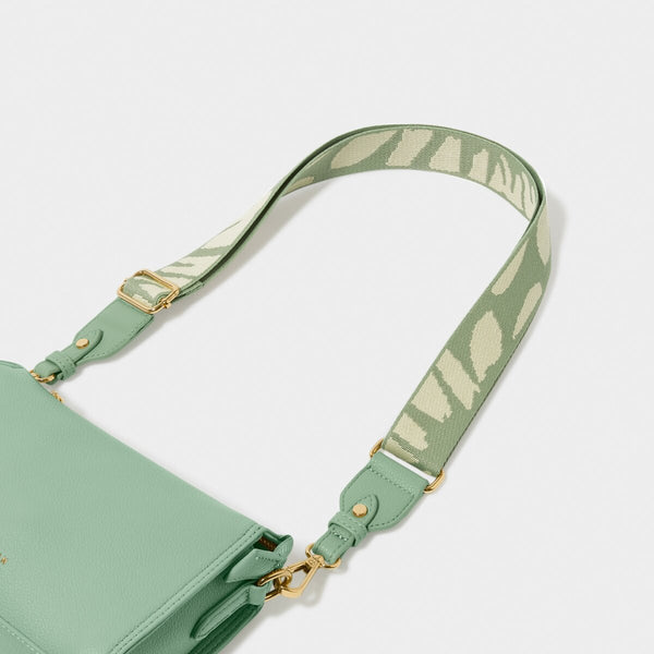 Abstract print detachable bag strap