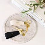 Katie Loxton beautifully boxed Mr & Mrs keyring set in black and white with gold tone hardware. 