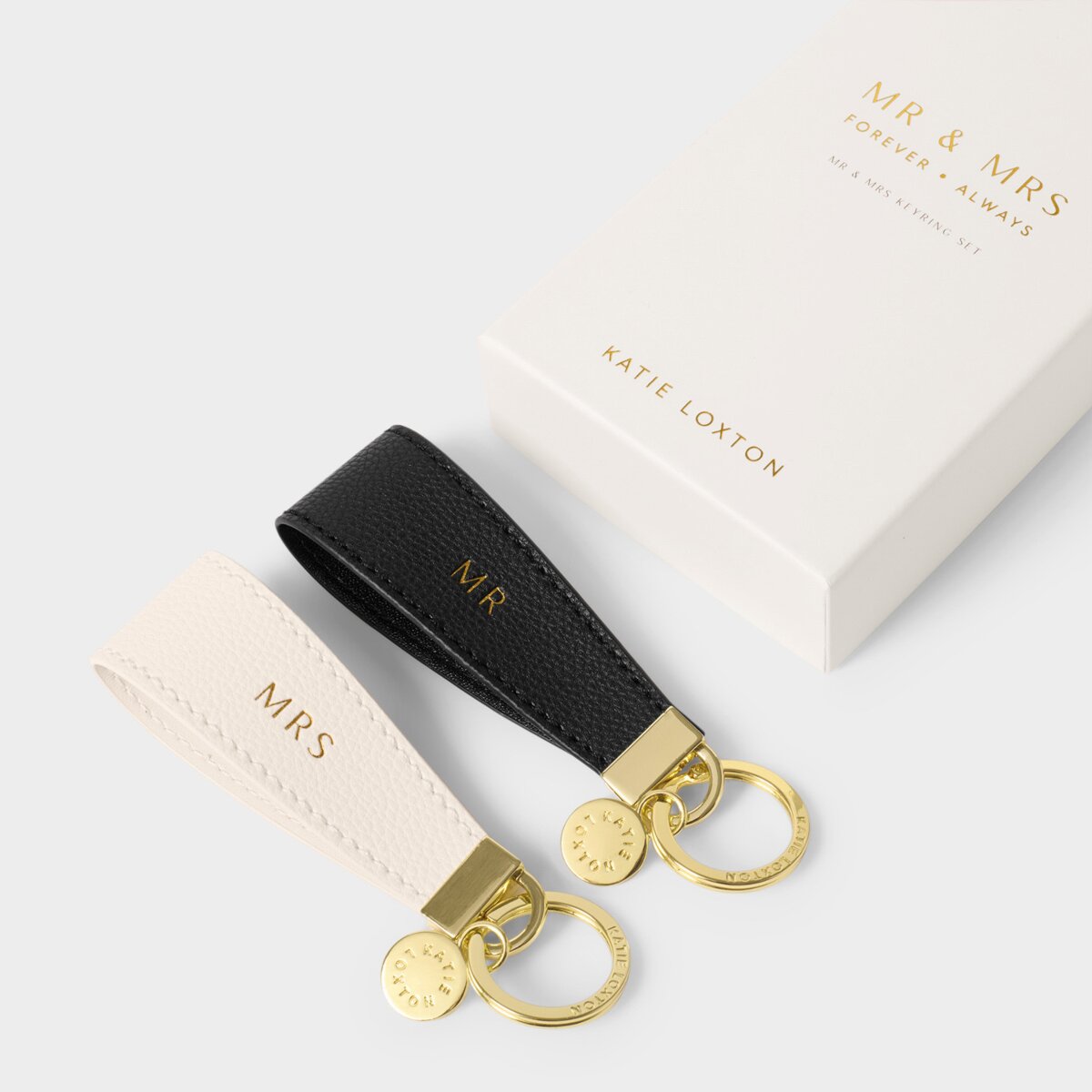 Katie Loxton beautifully boxed Mr & Mrs keyring set in black and white with gold tone hardware. 