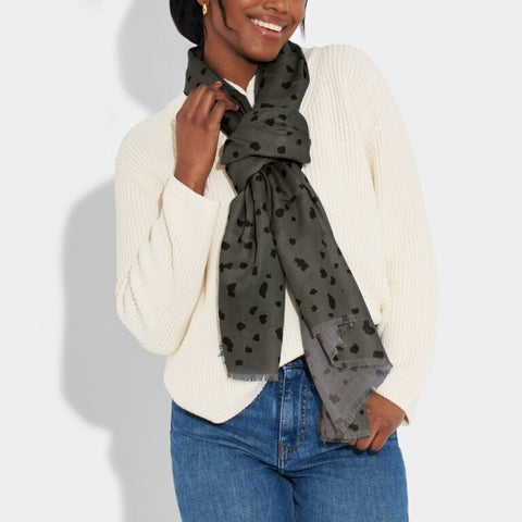  Model wearing Charcoal scarf with polka dot print