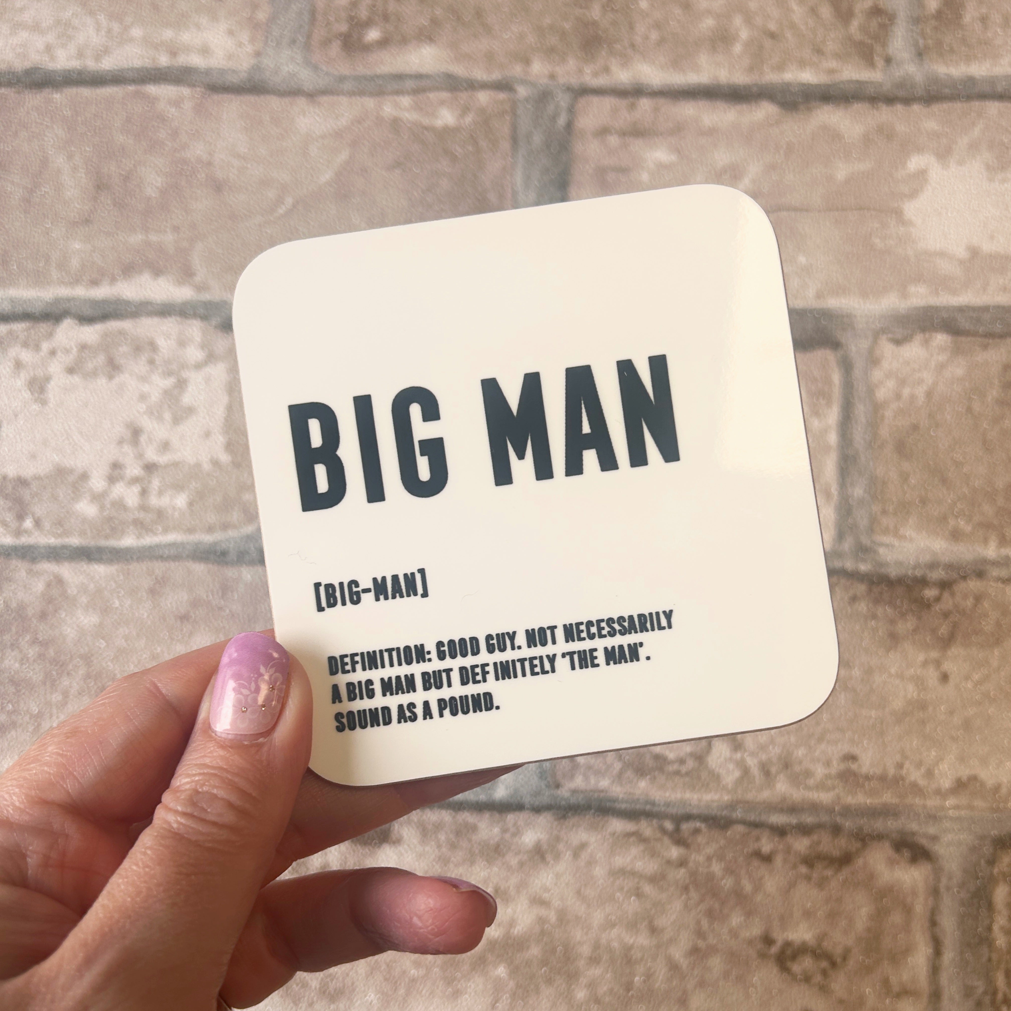 White gloss coaster featuring black 'Big Man' lettering with Scottish definition.