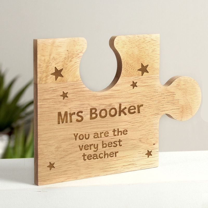 Personalised wooden jigsaw plaque or coaster for teacher with starry design.