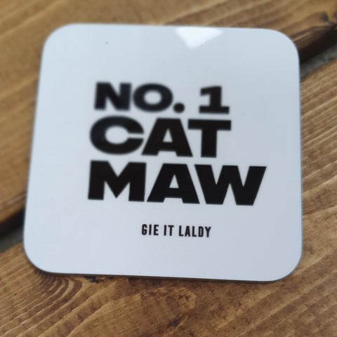 Monochrome Coaster featuring the Scottish slang slogan:   'No.1 Cat Maw  '  Printed in Glasgow.    Material:  Gloss coaster  Dimensions: 9cm x 9cm  Colour - White background with black font