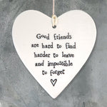 East of India hanging porcelain heart which reads:  'Good friends are hard to find, harder to leave and impossible to forget'