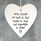 East of India hanging porcelain heart which reads:  'Good friends are hard to find, harder to leave and impossible to forget'