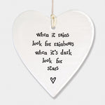 East of India hanging porcelain heart which reads:  'When it rains look for rainbows, when it's dark look for stars'