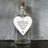 East of India hanging porcelain heart which reads:  'Grandchildren fill a space in your heart that you never knew was empty'