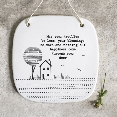 Hanging porcelain square sign from East of India which reads may your troubles be less, your blessings be more and nothing but happiness come through your door