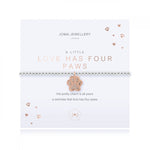 This cute silver plated stretch bracelet from Joma Jewellery's 'a little' pet range features an adorable little rose gold dog paw charm and comes presented on a sentiment card which reads:  'A Little'  'Love has four paws'  'this pretty charm is all yours, a reminder that love has four paws'