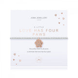 This cute silver plated stretch bracelet from Joma Jewellery's 'a little' pet range features an adorable little rose gold dog paw charm and comes presented on a sentiment card which reads:  'A Little'  'Love has four paws'  'this pretty charm is all yours, a reminder that love has four paws'