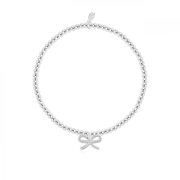 This cute, sparkling stretch bracelet from Joma Jewellery's 'Confetti A Littles' range is a beautiful gift idea to thank someone for their kindness.  The silver plated bracelet features a sparkly bow charm and comes presented on a card with the sentiment:  'A Little'  'Thank You'  'this little bracelet is just for you, a sparkling bow to say thank you!'