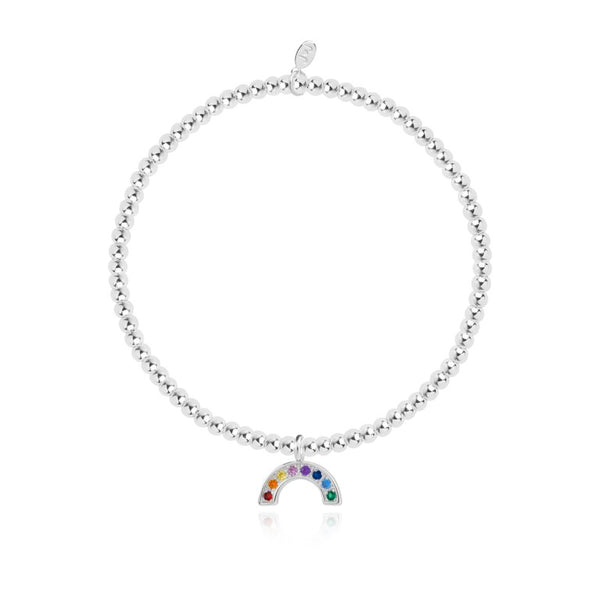 Joma Jewellery 'a little' bracelet with pretty little charm, presented on a sentiment card which reads:  'Wear this little charm wherever you go, brave the storm to see the rainbow'  Beautifully packaged in it's own Joma Jewellery envelope and gifting card.