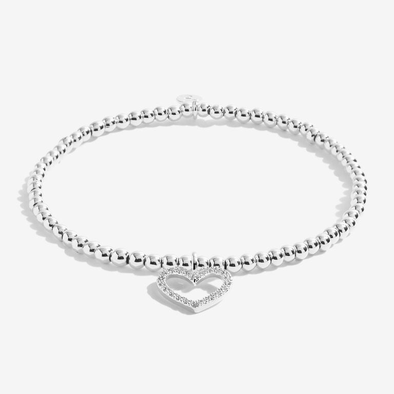Joma Jewellery 'a little' bracelet with pretty little charm, presented on a sentiment card which reads:  'This special bracelet is just to say, you're turning sweet sixteen – hip hip hooray'  Beautifully packaged in it's own Joma Jewellery envelope and gifting card.
