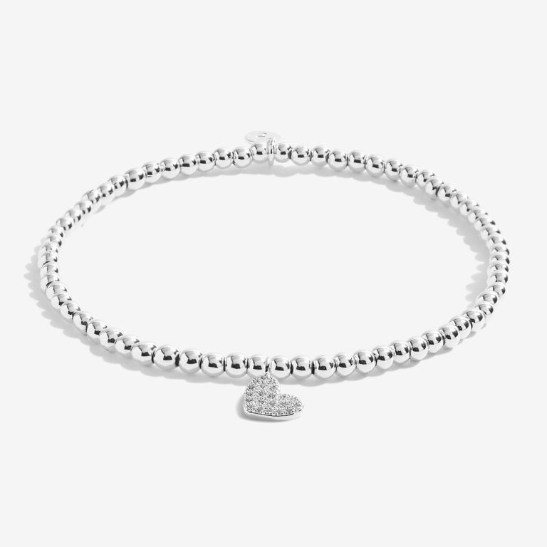 Joma Jewellery 'a little' bracelet with pretty little charm, presented on a sentiment card which reads:  'Wear this little bracelet for all to see, it's your eighteenth birthday – time to party'  Beautifully packaged in it's own Joma Jewellery envelope and gifting card.