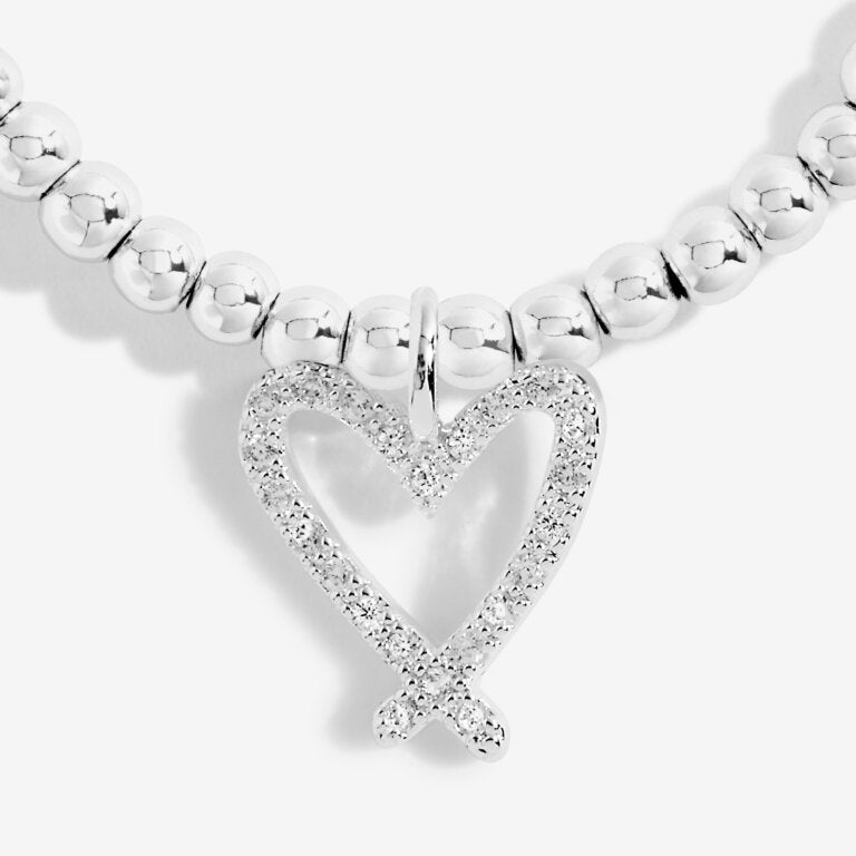 Joma Jewellery 'a little' bracelet with pretty little charm, presented on a sentiment card which reads:  'This bracelet is to celebrate turning twenty-one, hip hip hooray – the fun has just begun!'  Beautifully packaged in it's own Joma Jewellery envelope and gifting card.