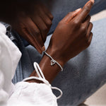 Joma Jewellery 'a little' bracelet with pretty little charm, presented on a sentiment card which reads:  'This bracelet is to celebrate turning twenty-one, hip hip hooray – the fun has just begun!'  Beautifully packaged in it's own Joma Jewellery envelope and gifting card.