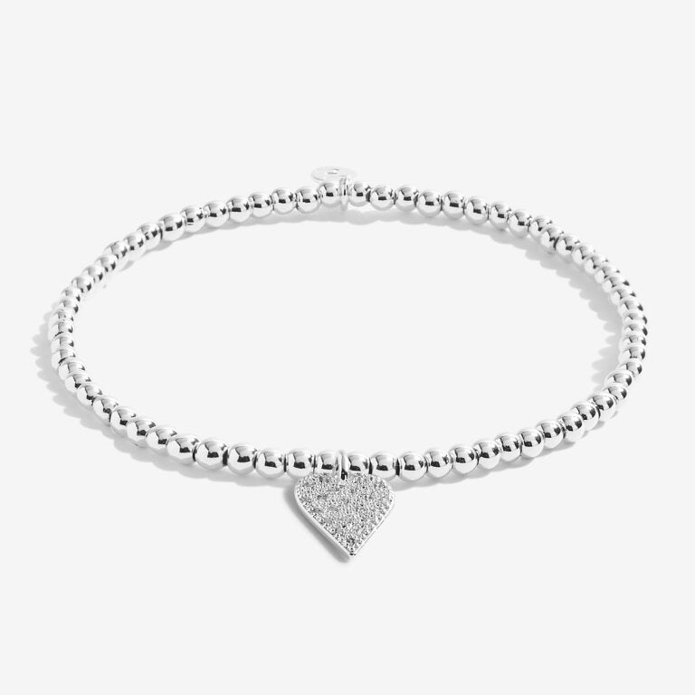 Joma Jewellery 'a little' bracelet with pretty little charm, presented on a sentiment card which reads:  'This special little bracelet is just to say, you're turning fifty – hip hip hooray!'  Beautifully packaged in it's own Joma Jewellery envelope and gifting card.