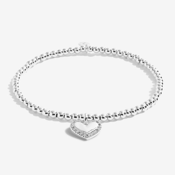 Joma Jewellery 'a little' bracelet with pretty little charm, presented on a sentiment card which reads:  'This special little bracelet is just to say, you're turning sixty – hip hip hooray!'  Beautifully packaged in it's own Joma Jewellery envelope and gifting card.