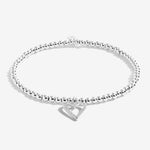 Joma Jewellery 'a little' bracelet with pretty little charm, presented on a sentiment card which reads:  'This special little bracelet is just to say, you're turning seventy – hip hip hooray!'  Beautifully packaged in it's own Joma Jewellery envelope and gifting card.