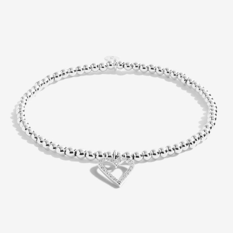 Joma Jewellery 'a little' bracelet with pretty little charm, presented on a sentiment card which reads:  'This special little bracelet is just to say, you're turning seventy – hip hip hooray!'  Beautifully packaged in it's own Joma Jewellery envelope and gifting card.