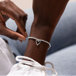 Joma Jewellery 'a little' bracelet with pretty little charm, presented on a sentiment card which reads:  'This special little bracelet is just to say, you're turning seventy – hip hip hooray!'  Beautifully packaged in it's own Joma Jewellery envelope and gifting card.