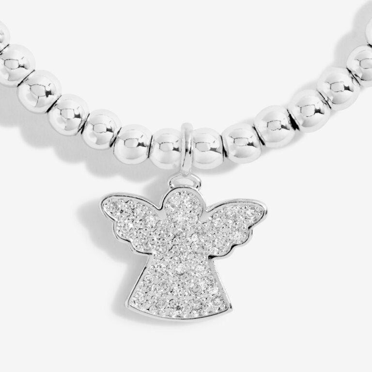 Joma Jewellery 'a little' bracelet with pretty little charm, presented on a sentiment card which reads:  'Wear this charm bracelet with all you do, and know angels are watching over you'  Beautifully packaged in it's own Joma Jewellery envelope and gifting card.