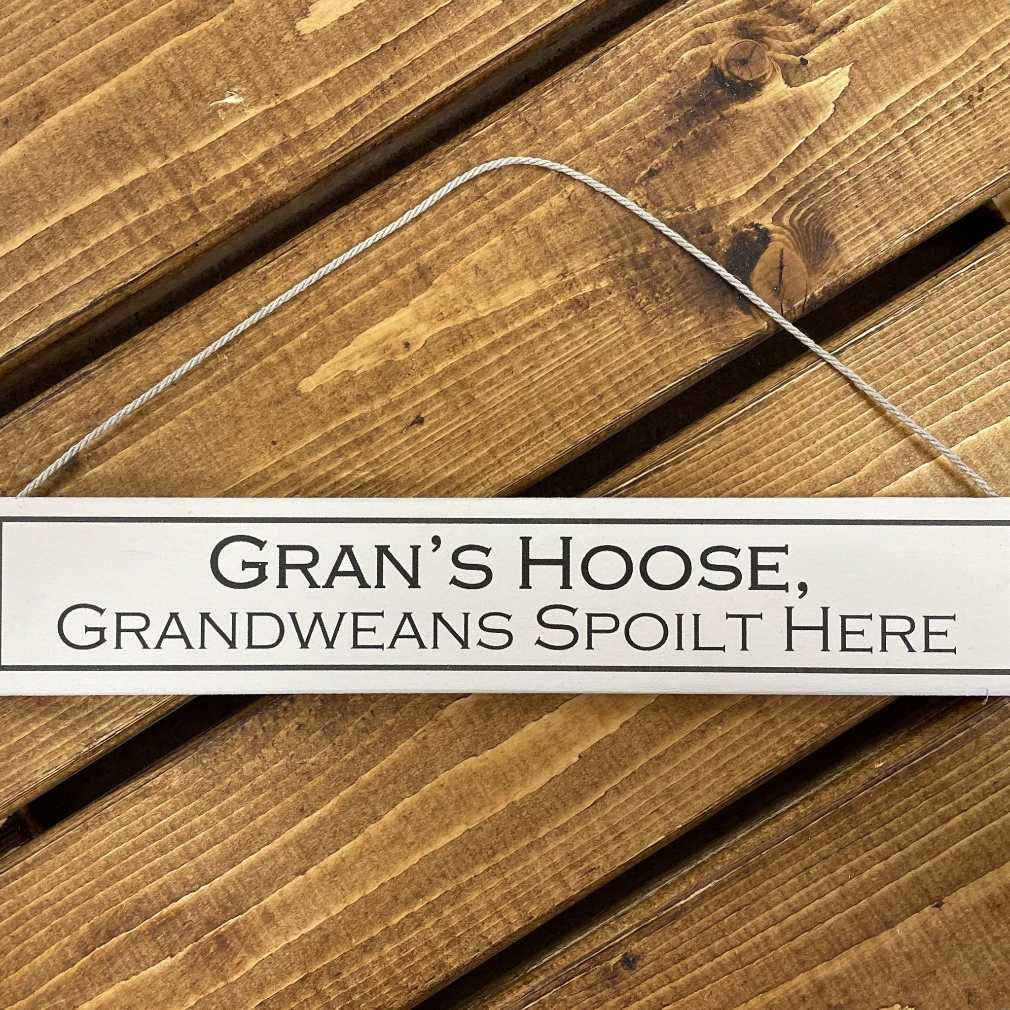 Rustic hanging wooden sign - hand painted with the printed slogan: 'Gran's Hoose, grandweans spoilt here' Handmade in the UK