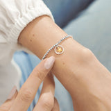 Silver new job sentiment bracelet with charm