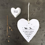 White Hanging Porcelain 'Wobbly' Round Heart from East of India which reads:  'Our laughs are limitless, memories countless and friendship endless.'  The heart features an engraved illustration in East of India's unique style.