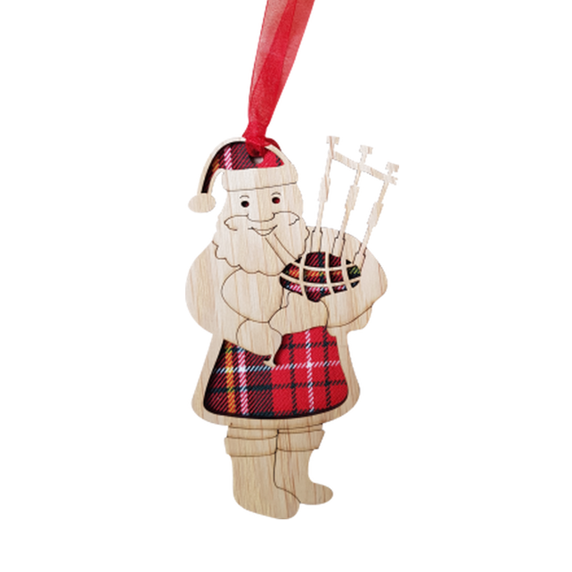 A unique keepsake Christmas decoration with a Scottish twist.  A wooden Santa with bagpipes and tartan inserts, mounted on card and packaged in clear cellophane packets.