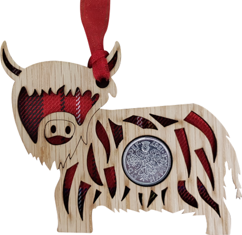Lucky sixpence on hanging wooden highland cow with tartan 