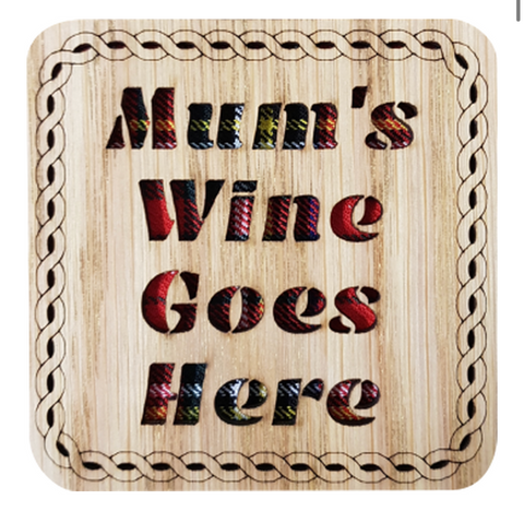 Wooden coaster with tartan insert and cut out text:  'Mums Wine Goes Here' ﻿  Made in Scotland