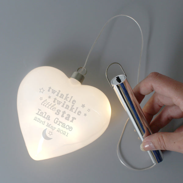 Beautiful personalised LED hanging heart, would make a lovely nightlight for your precious little ones nursery.  Personalise the front of your bauble with any name 2 lines of 20 characters per line, line 1 is mandatory.