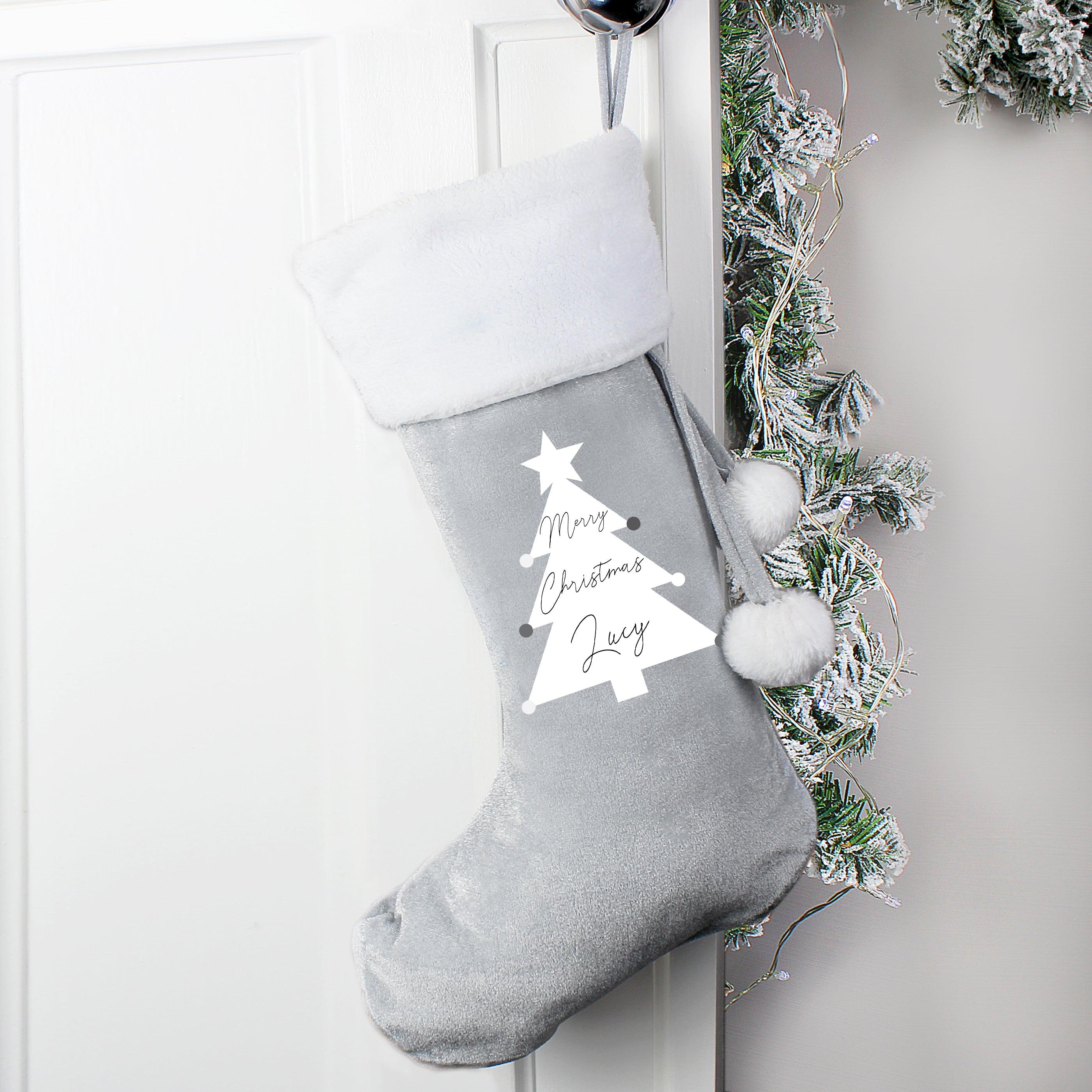 This personalised Christmas tree stocking is perfect for all those little stocking fillers, and looks super luxurious too. Beautiful Christmas decoration which can be stored to use year after year.  This pretty stocking can be personalised with a name up to 10 characters in length. All text is case sensitive and will appear as entered, 'Merry Christmas' is fixed