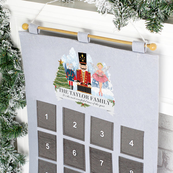 This personalised pocket Nutcracker Felt Advent Calendar is the perfect way for the children to count down for Santa this Christmas. Super gift which can be stored to use year after year and eco friendly too.   This pretty advent Calendar can be personalised with up to 2 lines of text:  First Line -25 characters (the text is fixed upper case) 2nd Line - 40 characters