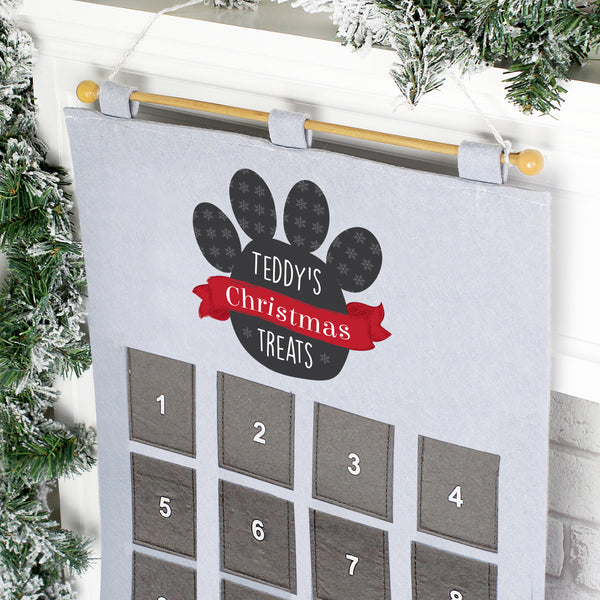 This personalised pet pocket Felt Advent Calendar is the perfect way to count down to christmas with your pet. Super advent calendar which can be stored to use year after year and eco friendly too.   This pretty advent Calendar can be personalised with a name of up to 12 characters long. Personalisation will appear in block capitals.  The words 'Christmas Treats' are fixed text.