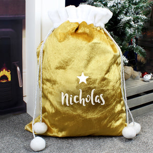 This personalised Christmas sack is the perfect way to present Christmas gifts and looks super luxurious too with beautiful pom pom ties.  It can be stored to use for that little bit of luxury year after year.  This pretty stocking can be personalised with a name up to 12 characters long.
