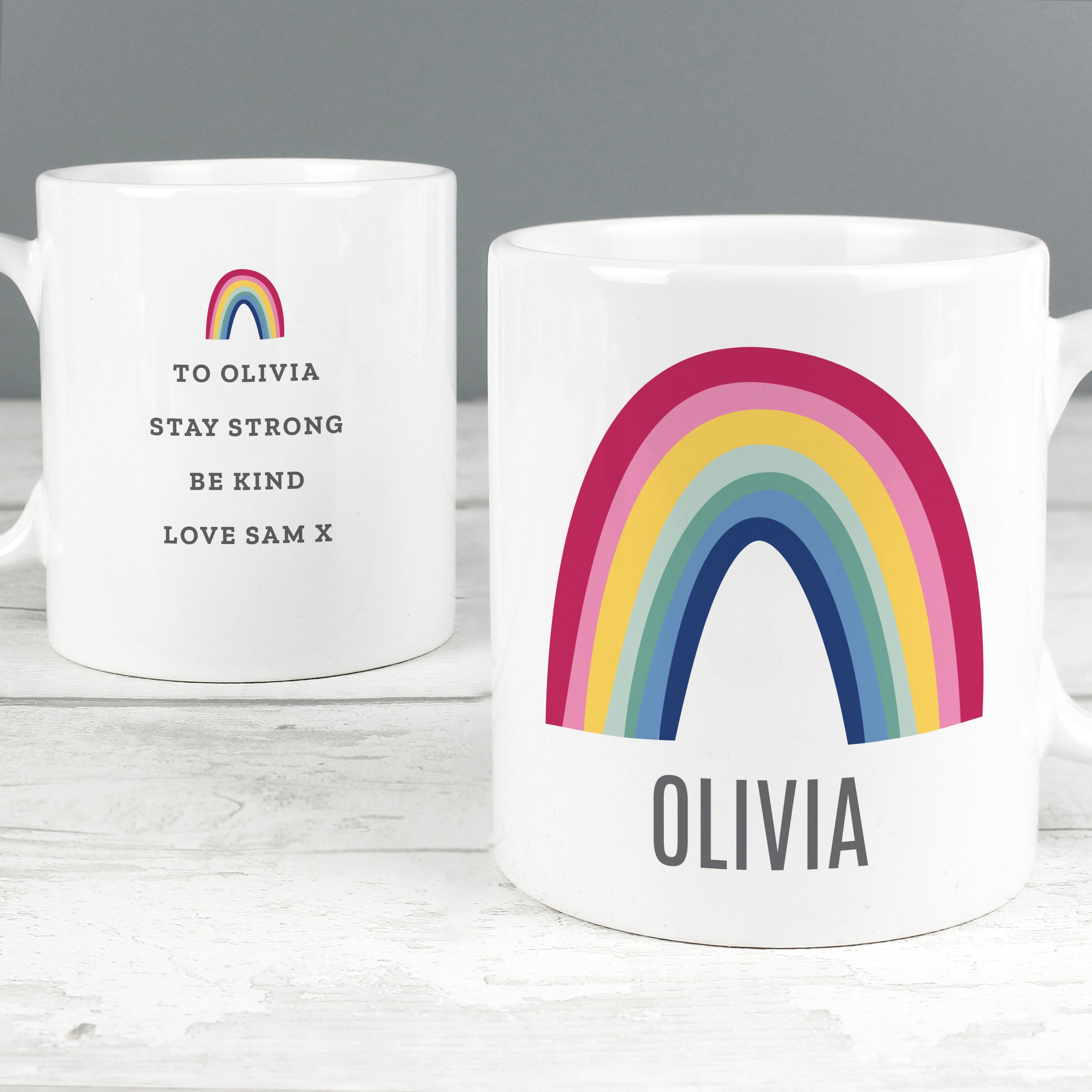 This lovely mug with a bright rainbow design is sure to make someone smile.  The front of the mug can be personalised with a name of up to 12 characters including spaces and punctuation.  The reverse of the mug can also be personalised with any message over 4 lines up to 25 characters per line.